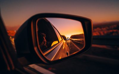 Side mirror view on the road